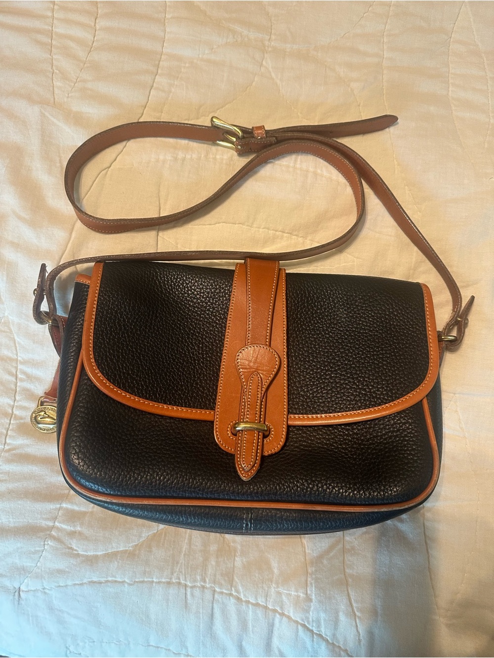 Dooney & Bourke Black with Tan Trim Pebble Leather Crossbody